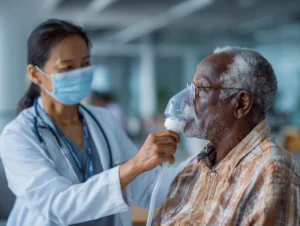 Stem Cell Doctor treating a patient suffering from COPD with a Stem Cell Nebulizer